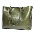 New fashion leather handbag shoulder cowhide shopping bag leather bag is simple and practical, portable
