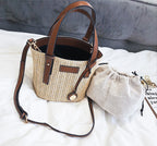 new summer women's bag hand-woven contrast color bucket straw bag cylinder handbag diagonal beach bag