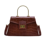 Stylish crocodile-print handbag
