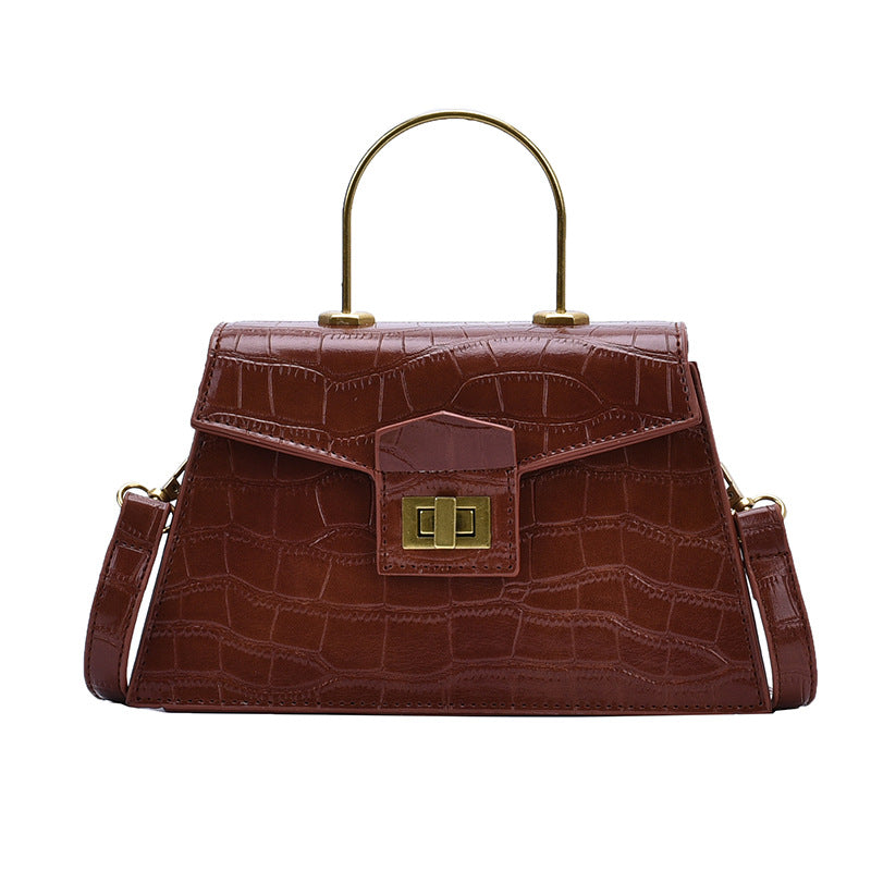 Stylish crocodile-print handbag
