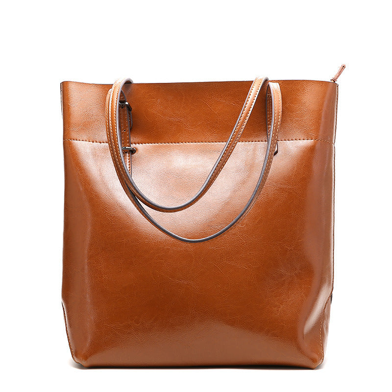 New fashion leather handbag shoulder cowhide shopping bag leather bag is simple and practical, portable