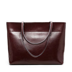 New fashion leather handbag shoulder cowhide shopping bag leather bag is simple and practical, portable