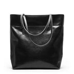 New fashion leather handbag shoulder cowhide shopping bag leather bag is simple and practical, portable