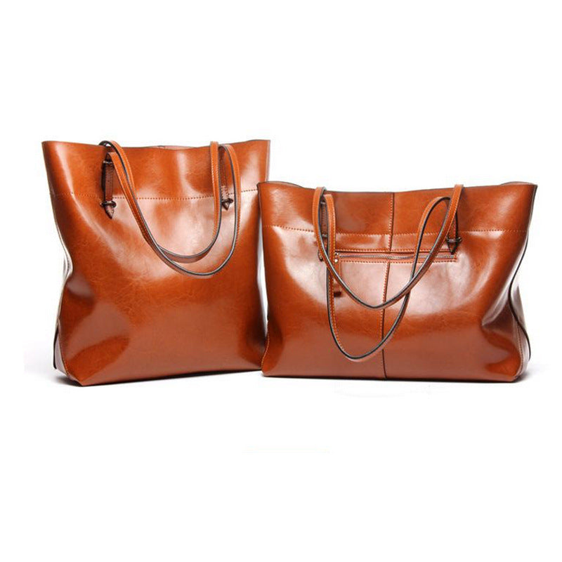 New fashion leather handbag shoulder cowhide shopping bag leather bag is simple and practical, portable