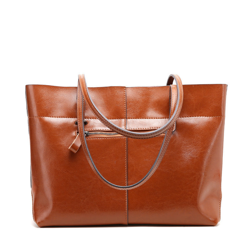 New fashion leather handbag shoulder cowhide shopping bag leather bag is simple and practical, portable