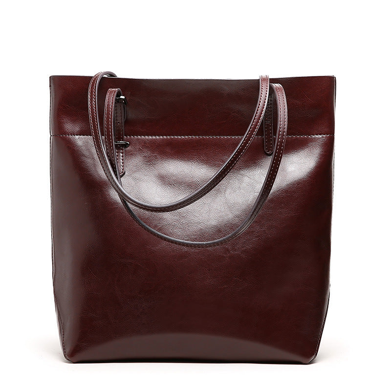 New fashion leather handbag shoulder cowhide shopping bag leather bag is simple and practical, portable