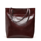New fashion leather handbag shoulder cowhide shopping bag leather bag is simple and practical, portable