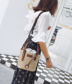 new summer women's bag hand-woven contrast color bucket straw bag cylinder handbag diagonal beach bag