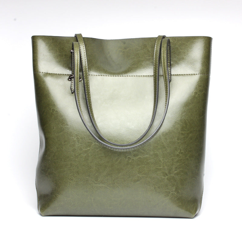 New fashion leather handbag shoulder cowhide shopping bag leather bag is simple and practical, portable